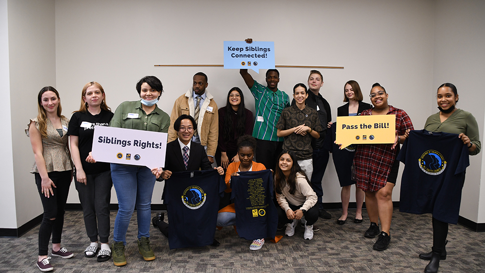 NJYRS members holding signes